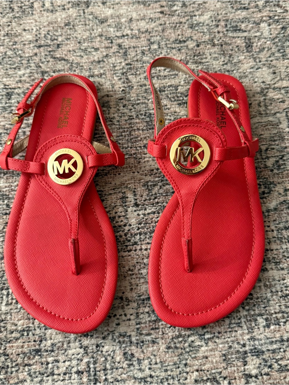 MICHAEL Michael Kors T-Strap Sandals with Gold Medallion